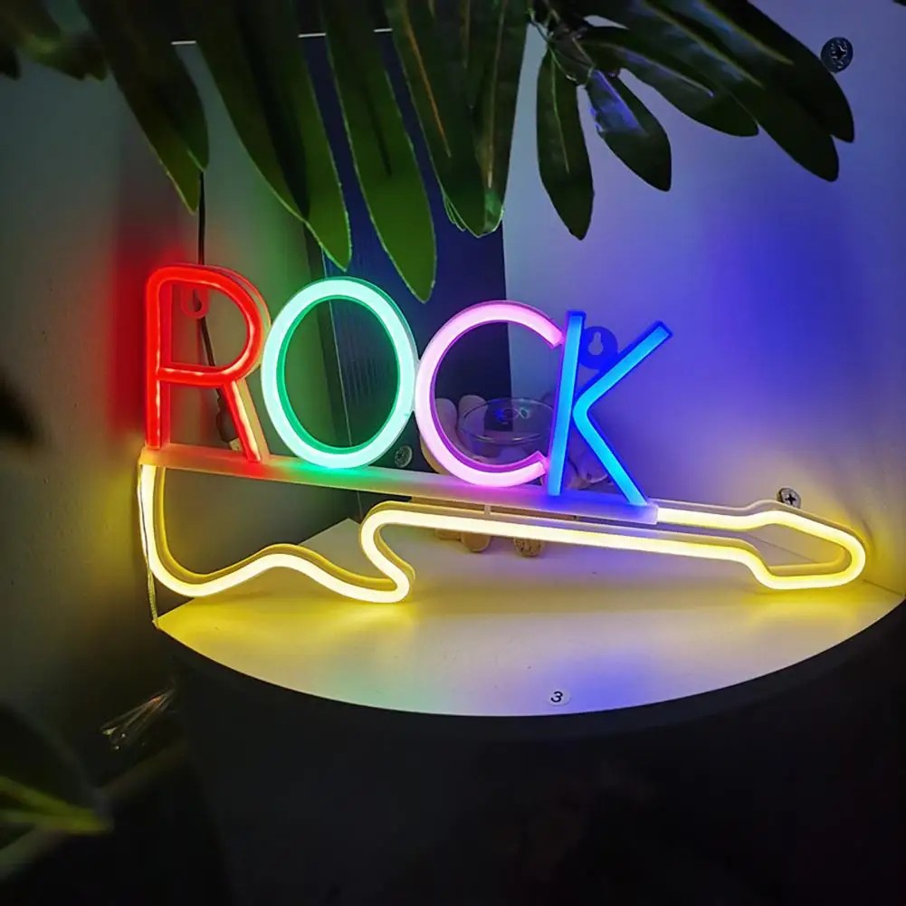led neonski natpis na zidu - rock gitara